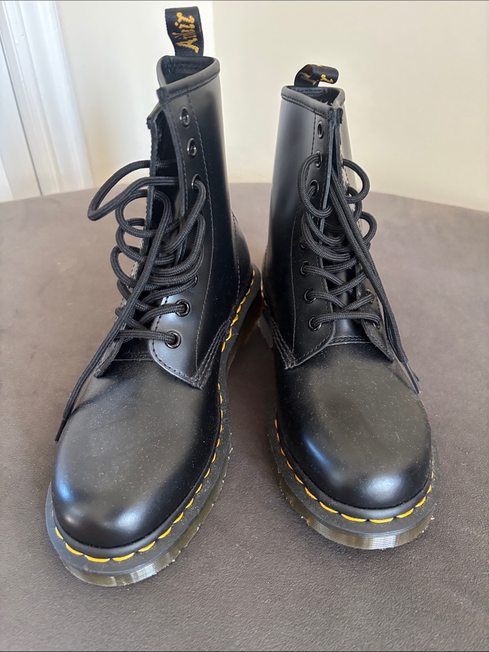 Dr. Martens Black Leather Combat Boots with Yellow Stitching